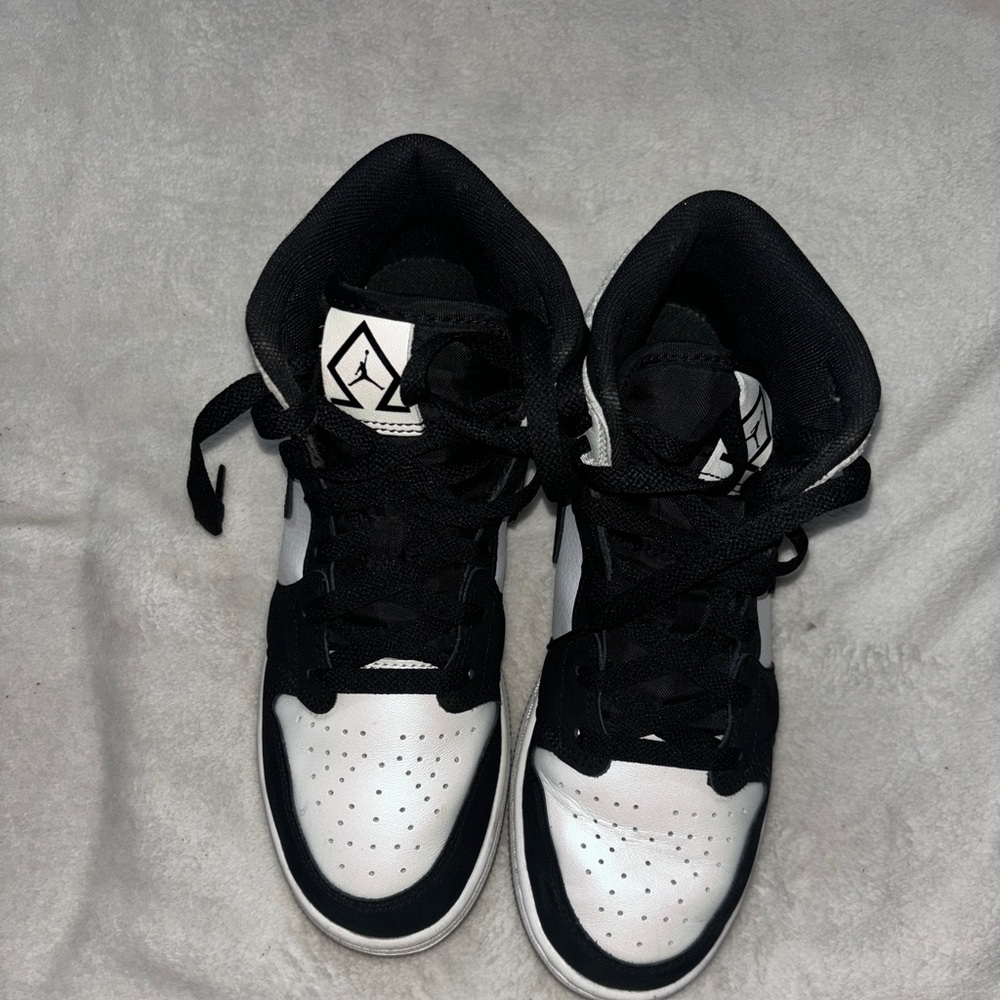 Holographic air Jordans high tops
